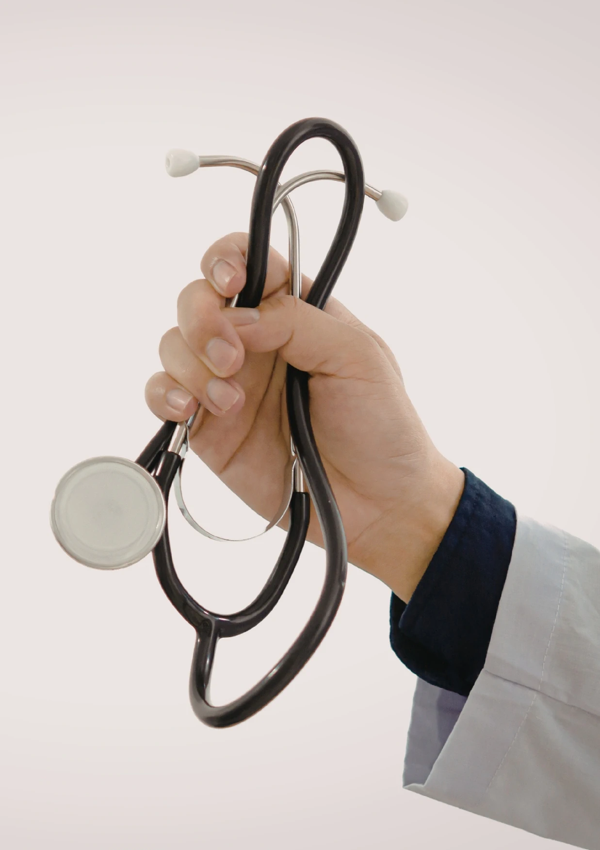 Internal medicine doctor in Dubai holding a stethoscope